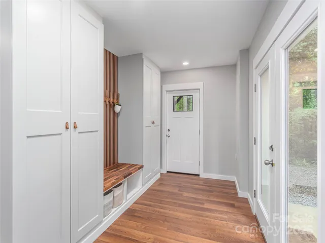 a view of a park with large trees