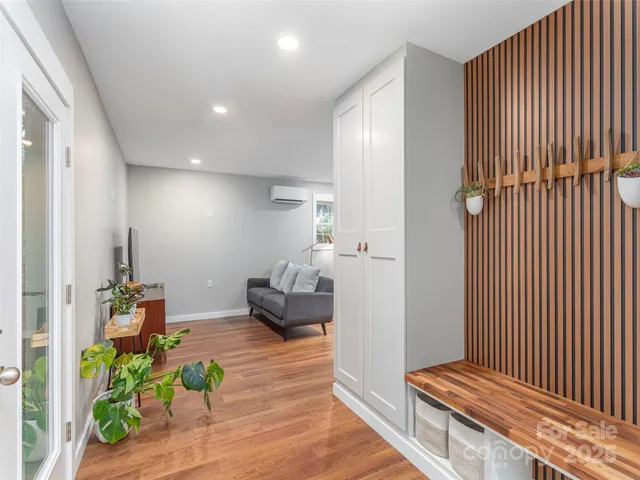 a view of a backyard with large trees