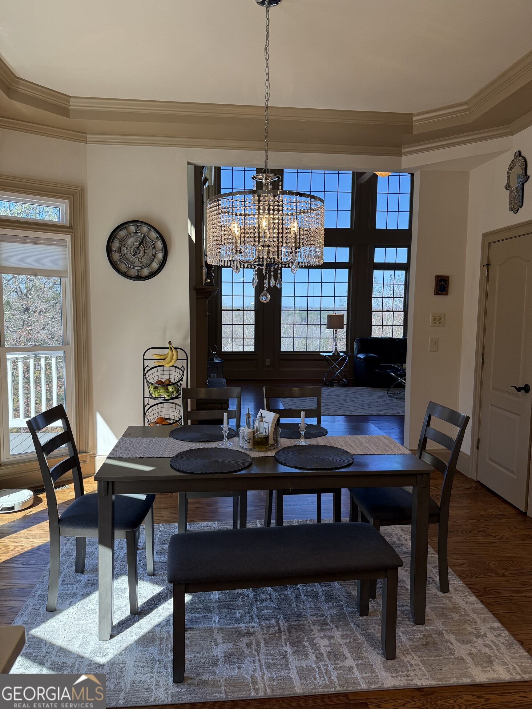990 Chateau Forest Road Hoschton, GA 30548 - Photo 38 of 117 a view of a dining room with furniture window and wooden floor
