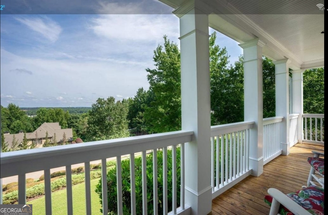 990 Chateau Forest Road Hoschton, GA 30548 - Photo 8 of 117 a view of a balcony with lake view