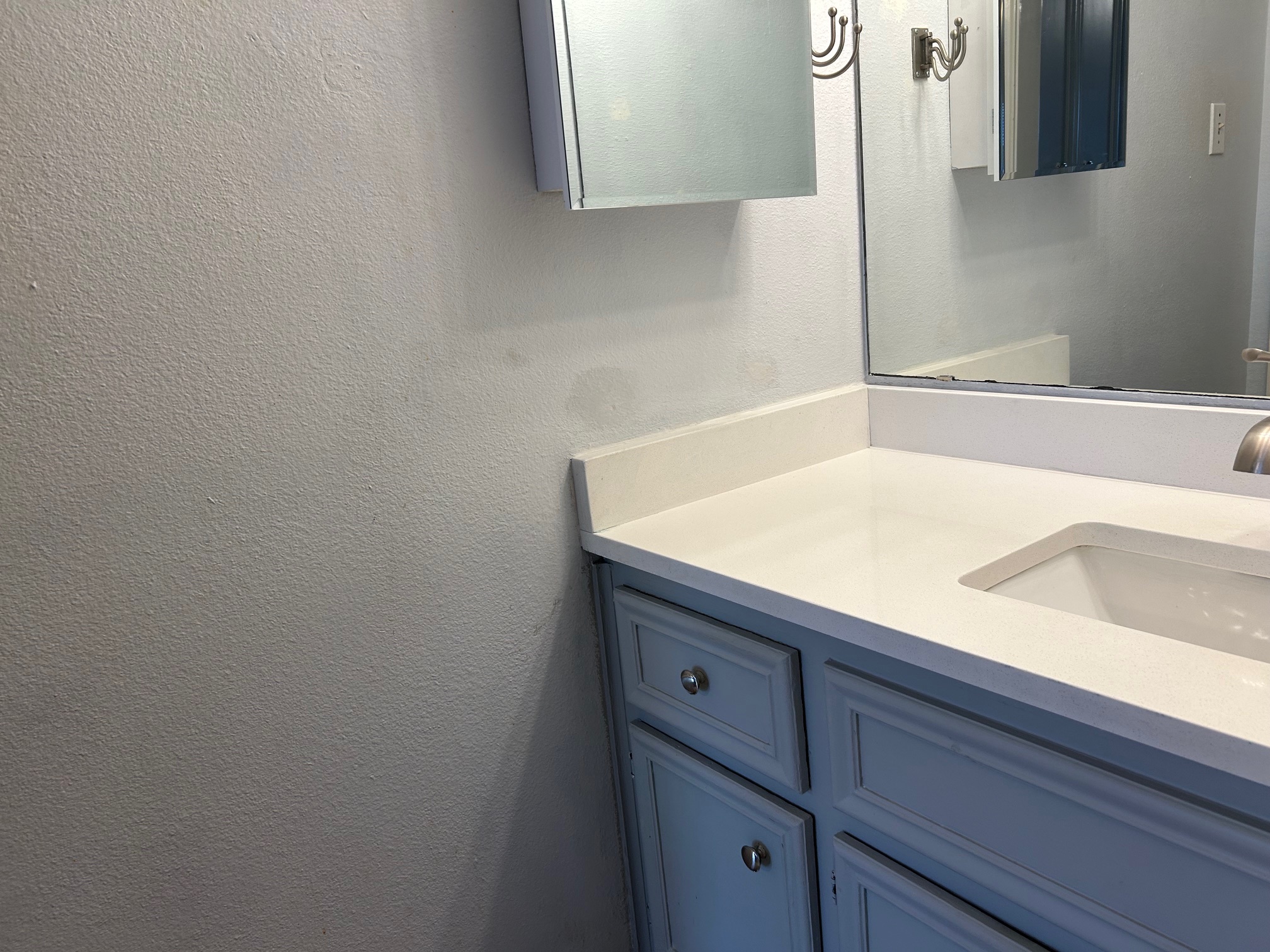 502 West 17th Street, Unit K Austin, TX 78701 - Photo 11 of 18 a sink with a vanity