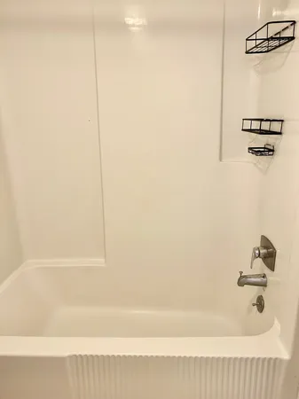 a bathroom with a bathtub