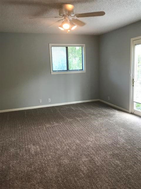 502 West 17th Street, Unit K Austin, TX 78701 - Photo 9 of 18 an empty room with a window