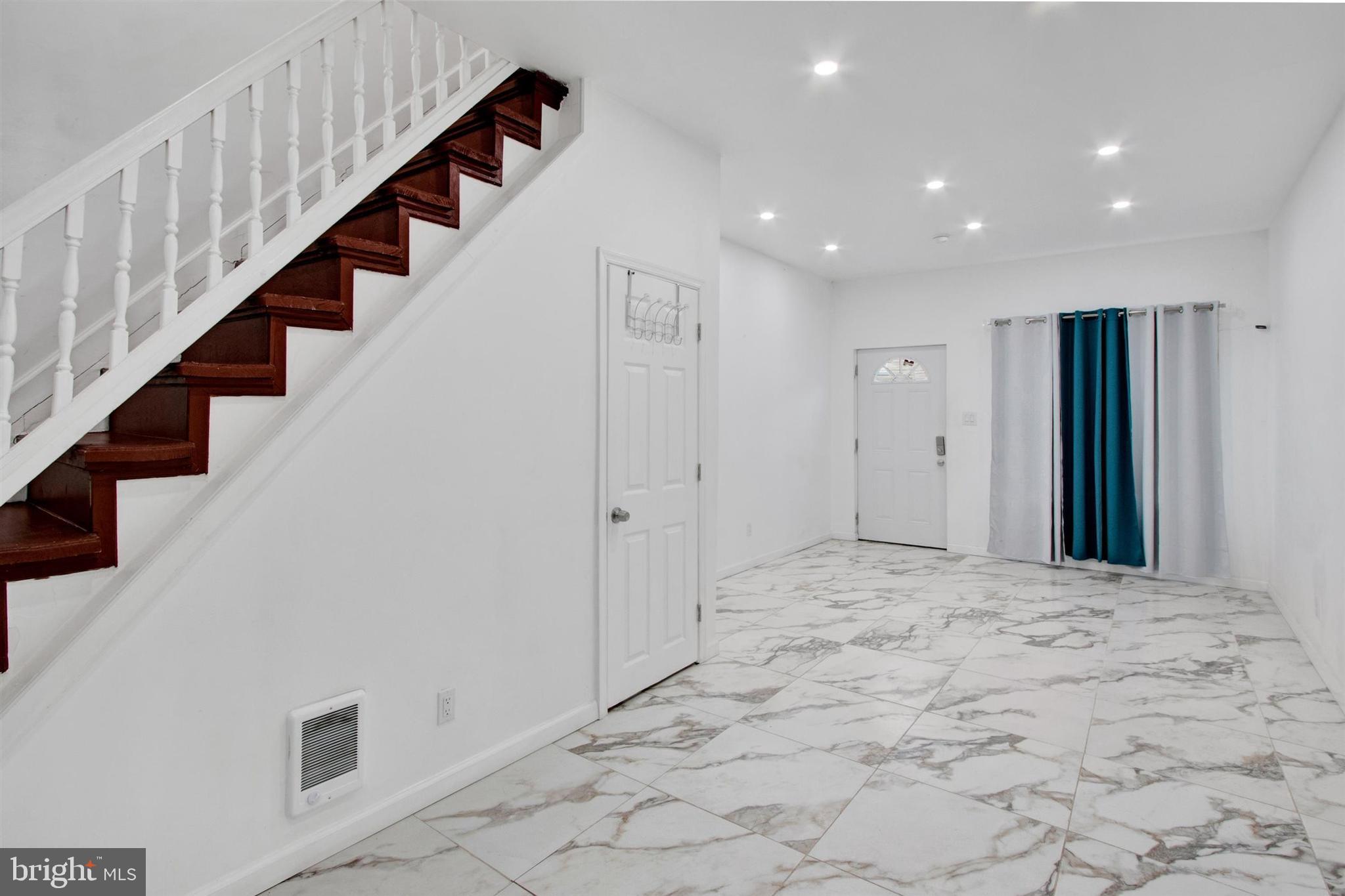 1045 Chestnut Street Reading, PA 19602 - Photo 5 of 21 a view of hallway with stairs