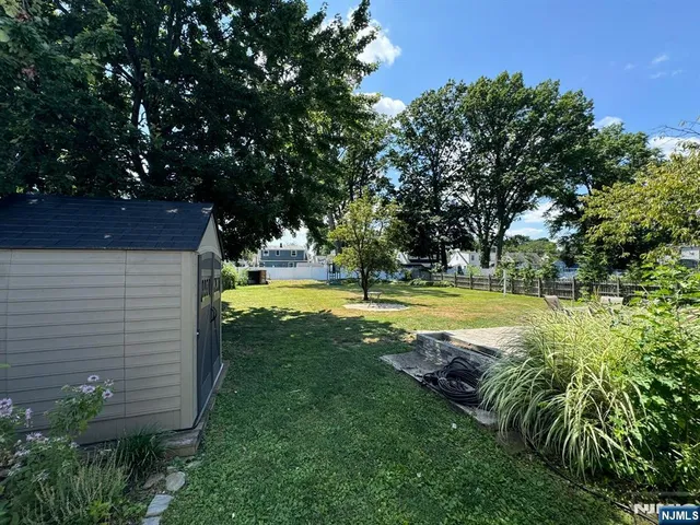 a view of a swimming pool with a garden