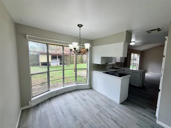 a bathroom with a bathtub a sink and a shower