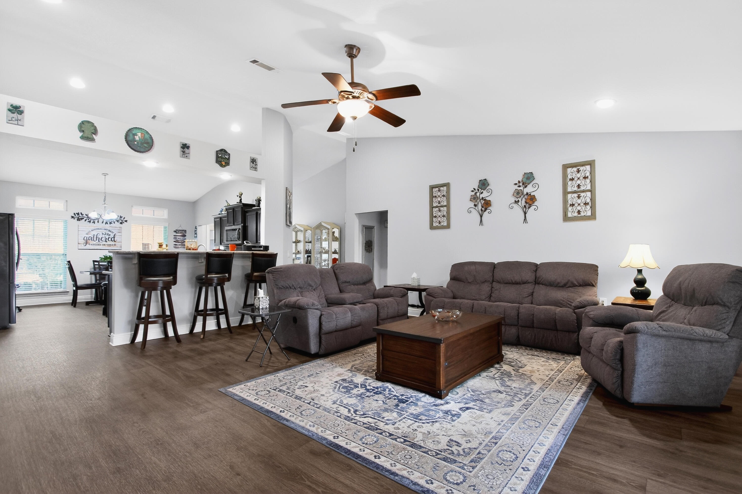 6317 Antigone Circle Crestview, FL 32536 - Photo 13 of 32 a living room with furniture and a dining table