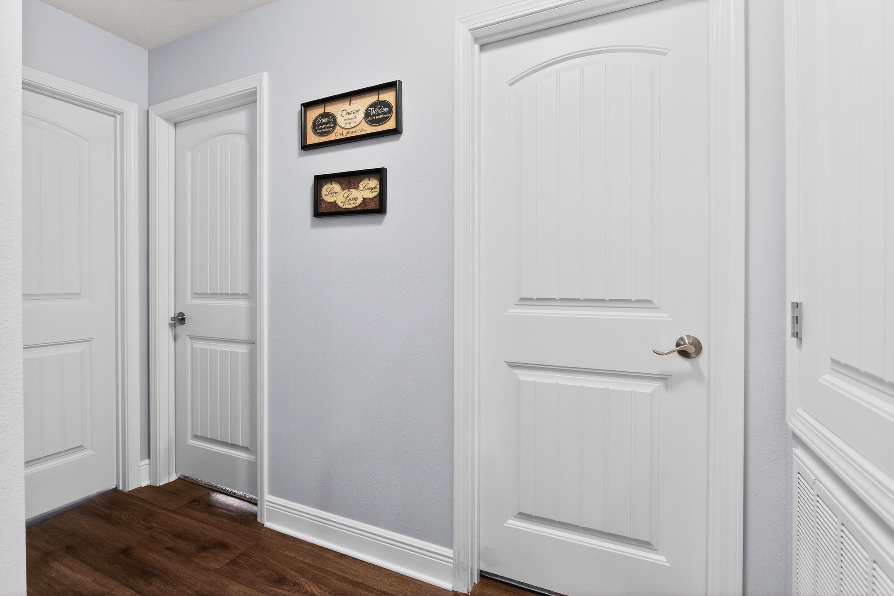 6317 Antigone Circle Crestview, FL 32536 - Photo 17 of 32 a area with wooden floor and closet