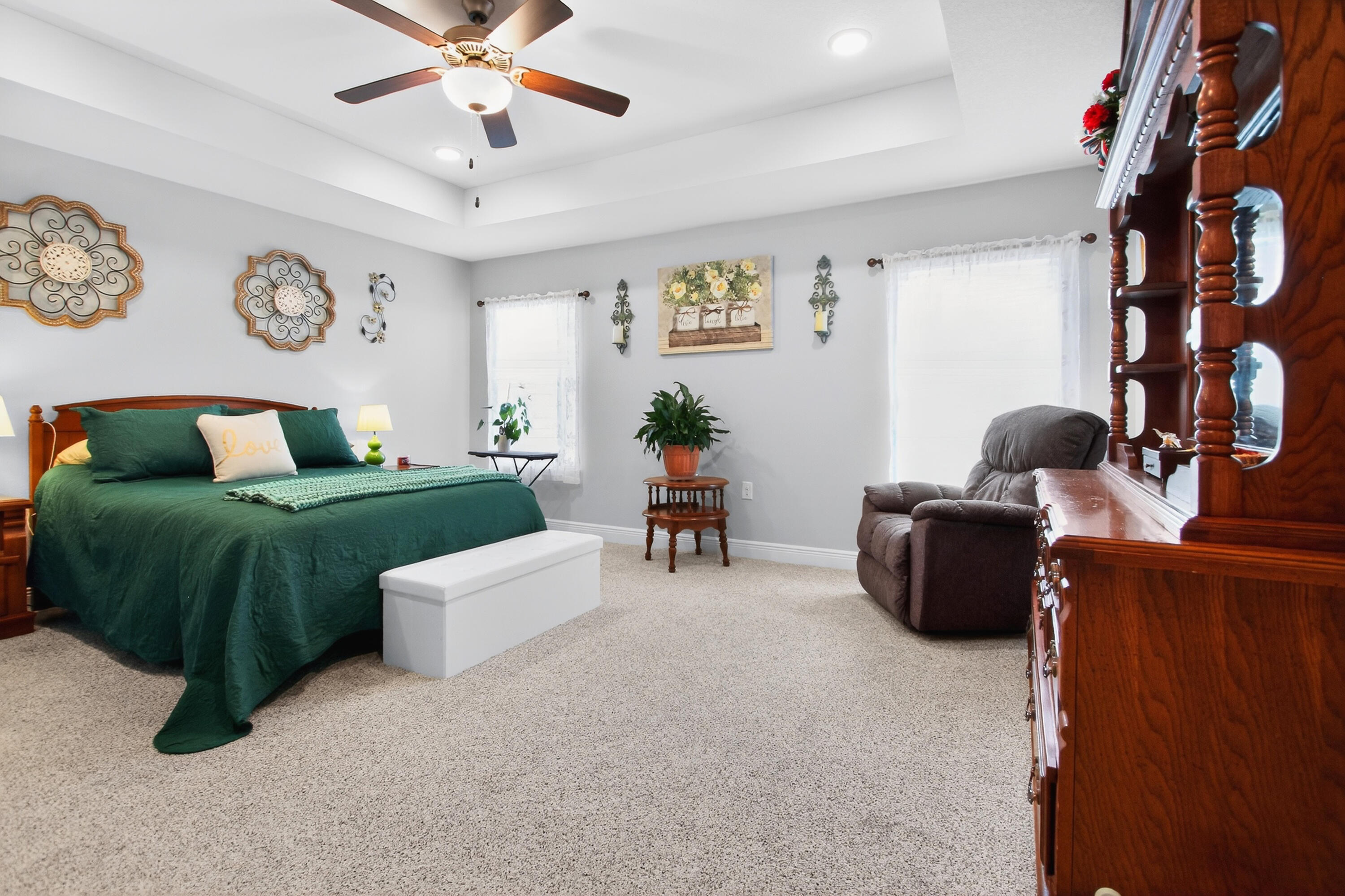 6317 Antigone Circle Crestview, FL 32536 - Photo 23 of 32 a living room with furniture and a chandelier