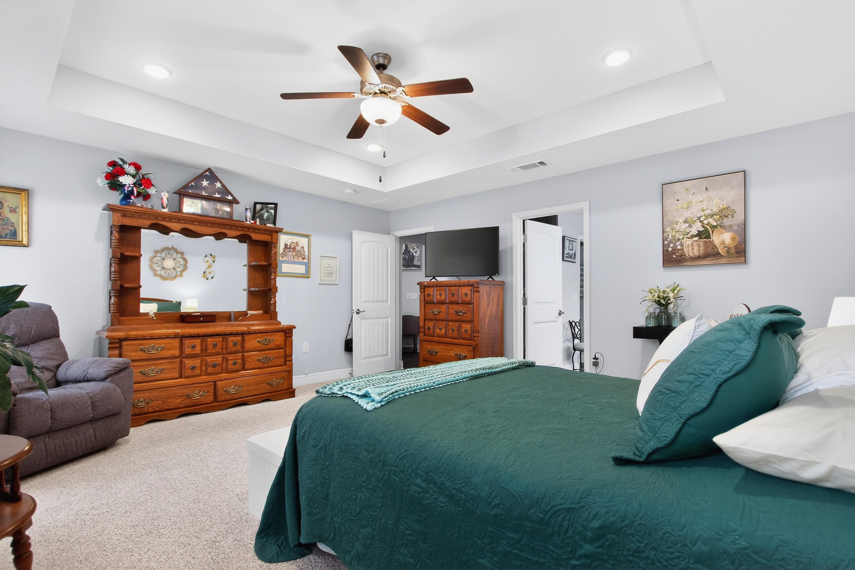 6317 Antigone Circle Crestview, FL 32536 - Photo 24 of 32 a bedroom with a bed a window and dresser