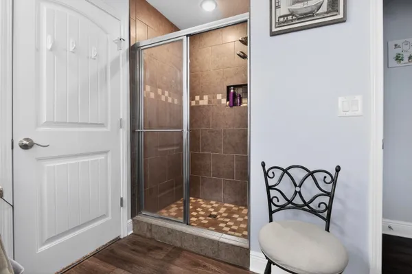 a bathroom with a tub and sink