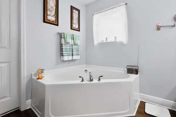 a bathroom with a double vanity sink and mirror