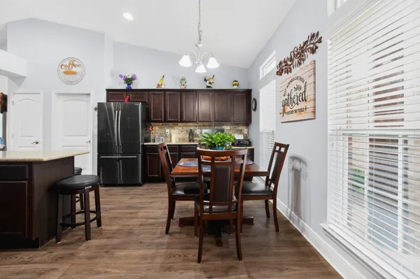 a view of a dining room with furniture