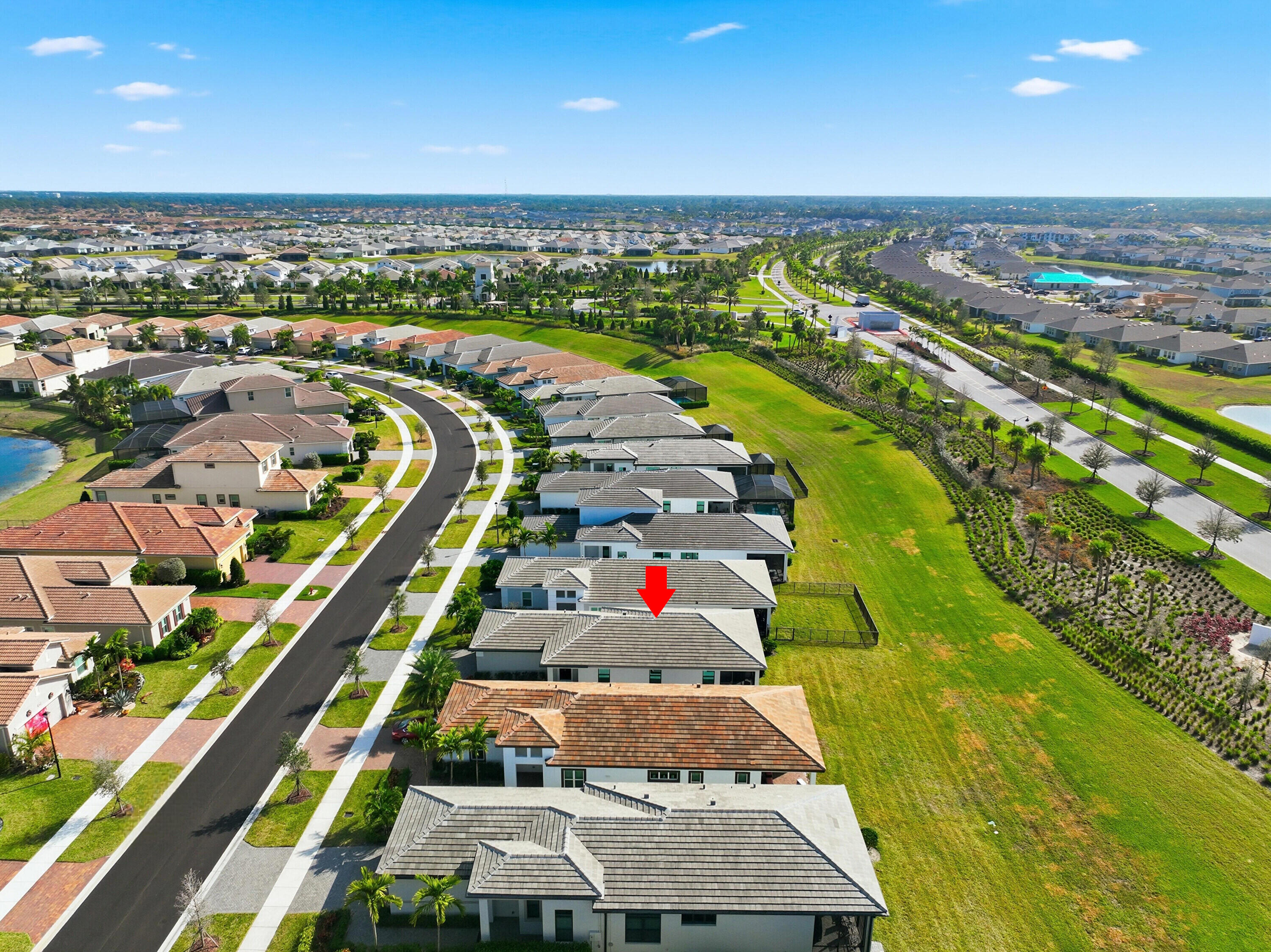 9321 Southwest Pepoli Way Port St. Lucie, FL 34987 - Photo 29 of 65 an aerial view of swimming pool and mountain view