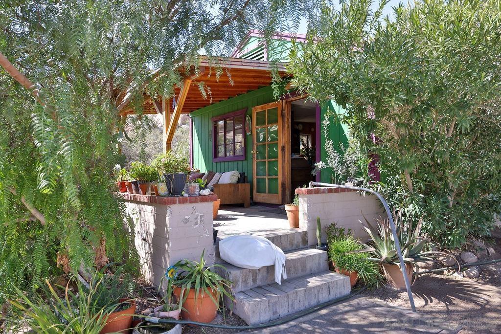 0 Tower & 3 Homes Jacumba, CA 91934 - Photo 15 of 41 a patio with table and chairs and potted plants