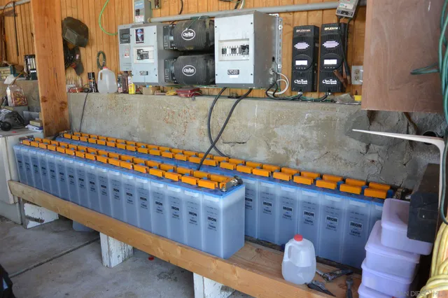 a view of a house with a snow in the background