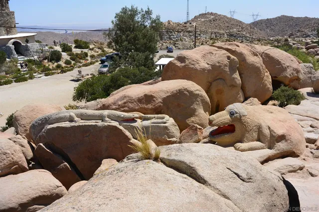 a view of a city with mountains in the background