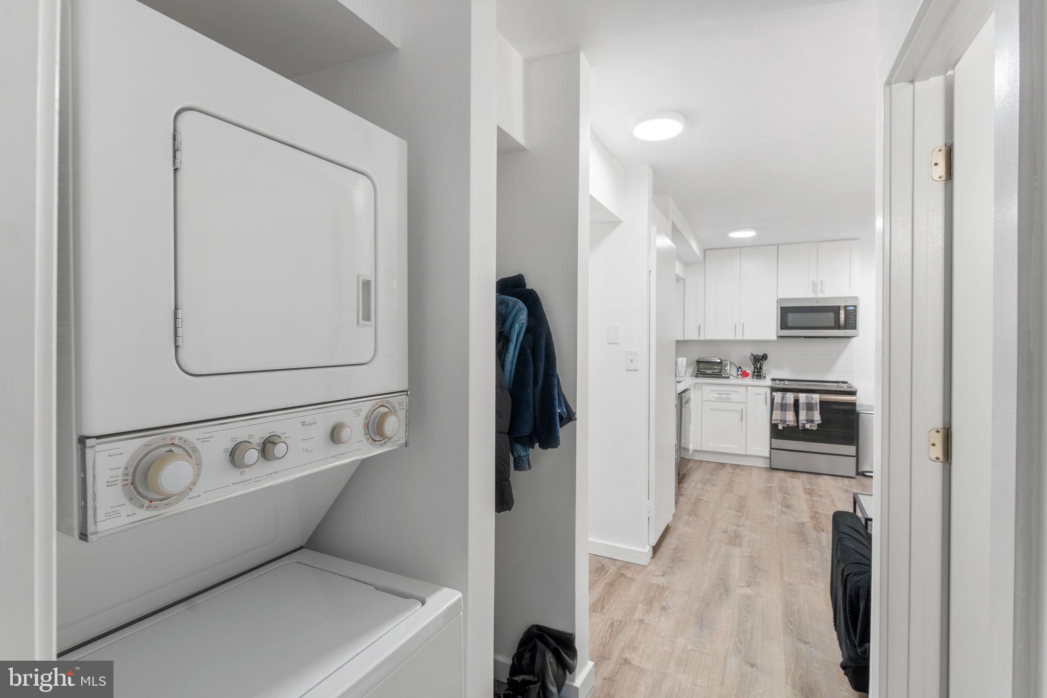 1119 6th Street Northwest, Unit 3 Washington, DC 20001 - Photo 9 of 9 a view of kitchen with washer and dryer