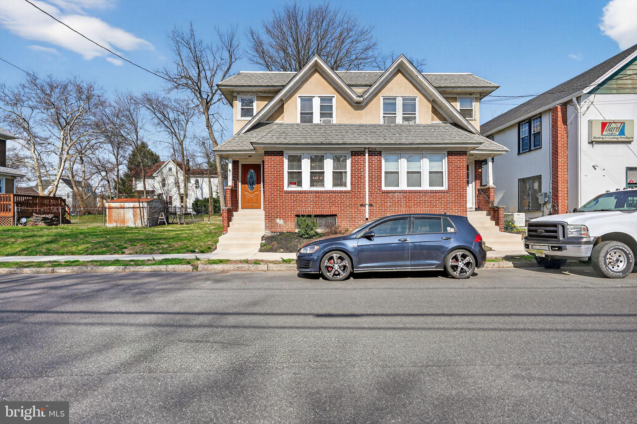 511 3rd Avenue Audubon, NJ 08106 - Photo 20 of 23 a car parked in front of a house
