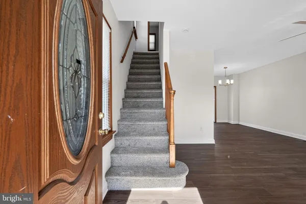 a view of an entryway with staircase