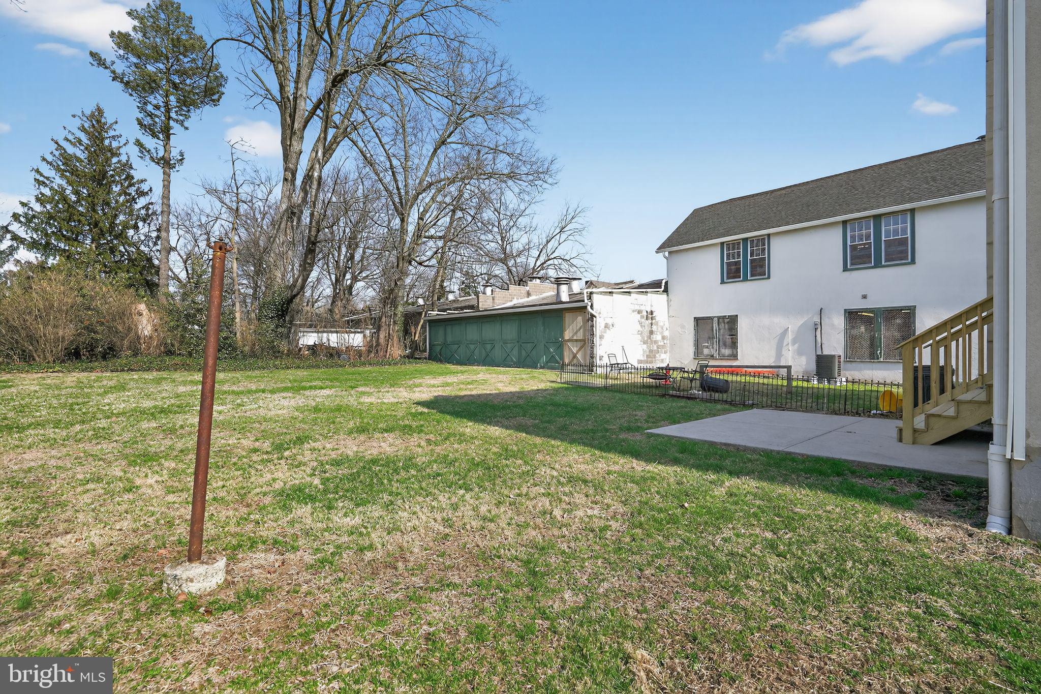 511 3rd Avenue Audubon, NJ 08106 - Photo 21 of 23 a view of a house with backyard and trees