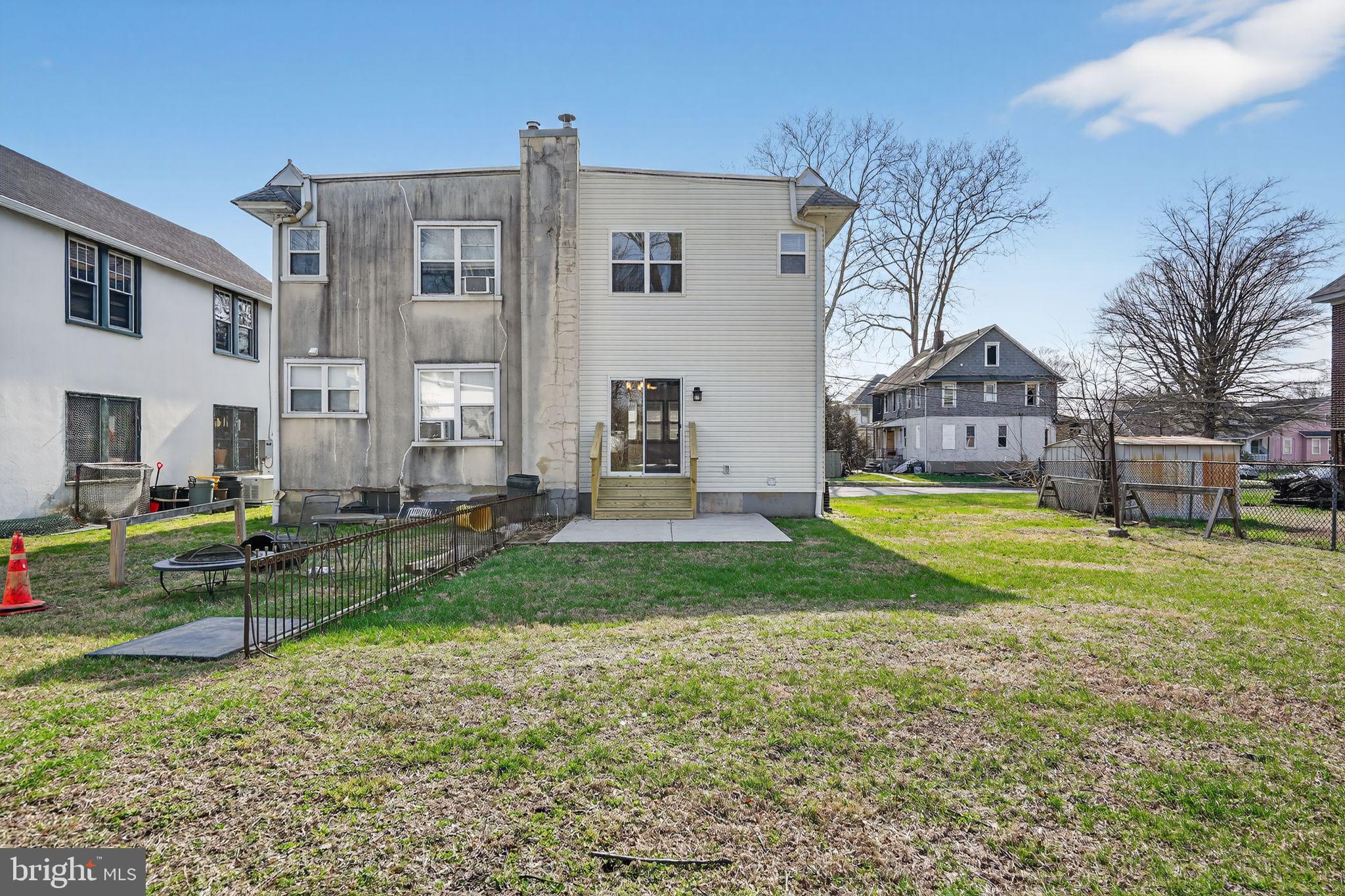 511 3rd Avenue Audubon, NJ 08106 - Photo 23 of 23 a view of a house with a big yard plants and large trees