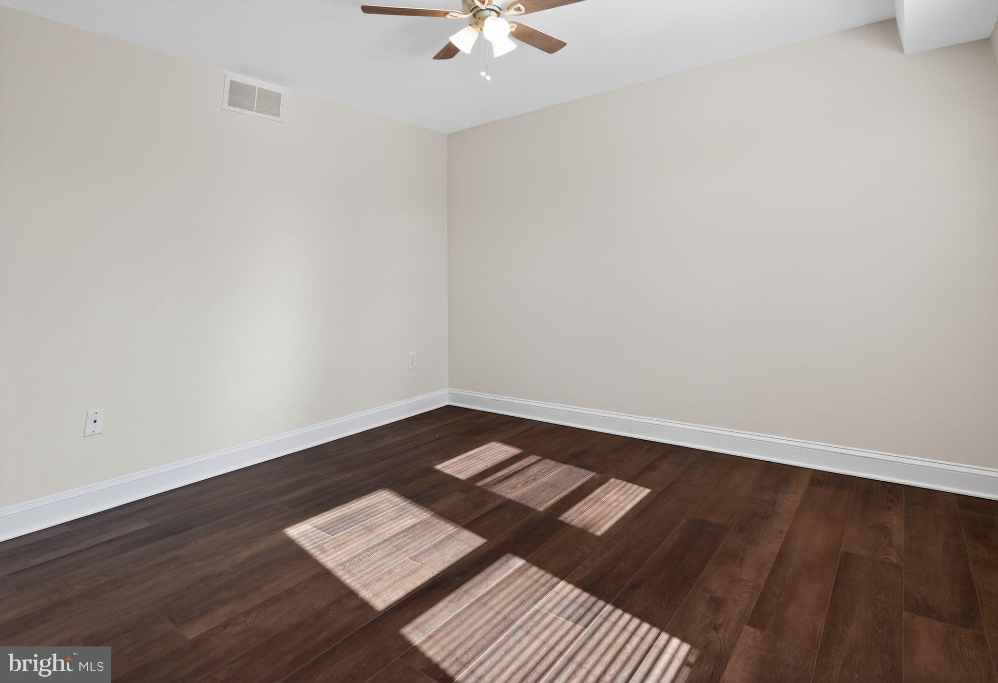 511 3rd Avenue Audubon, NJ 08106 - Photo 8 of 23 wooden floor in an empty room
