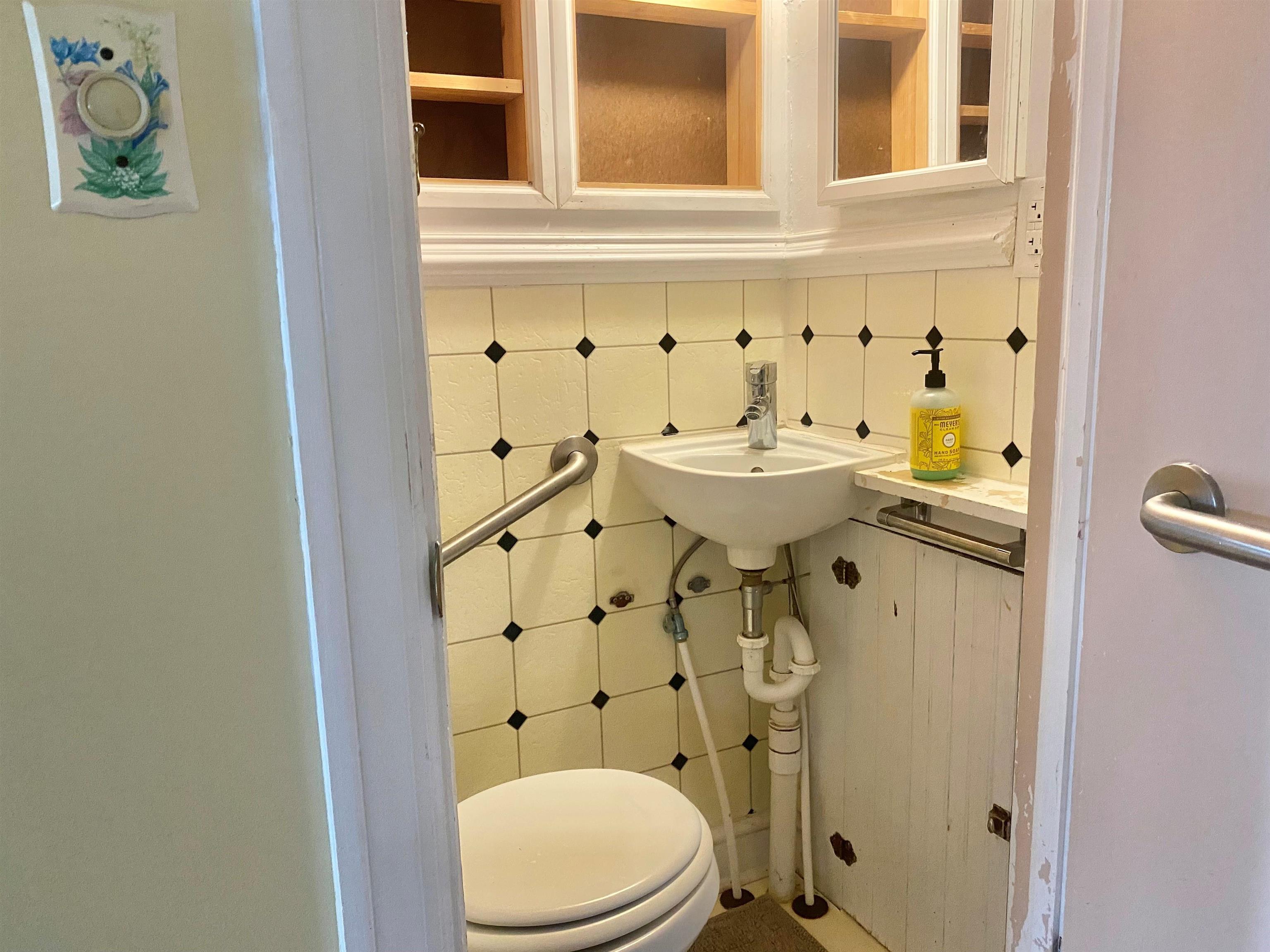 7766 Thomas Spring Road Bridgewater, VA 22812 - Photo 16 of 24 a bathroom with a sink a toilet and shower