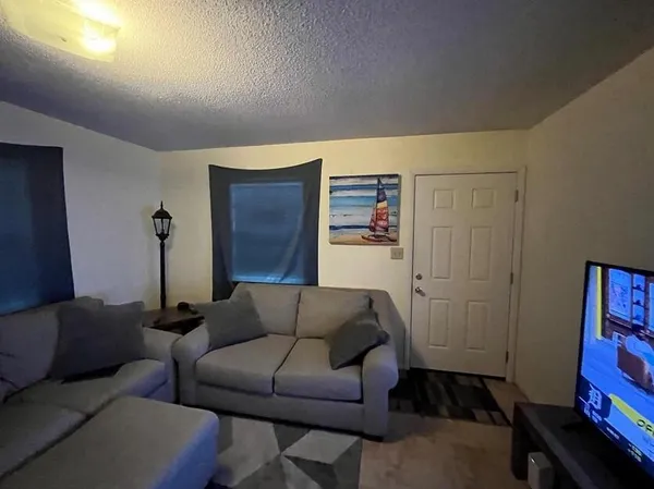 a kitchen with stainless steel appliances granite countertop a refrigerator sink and cabinets