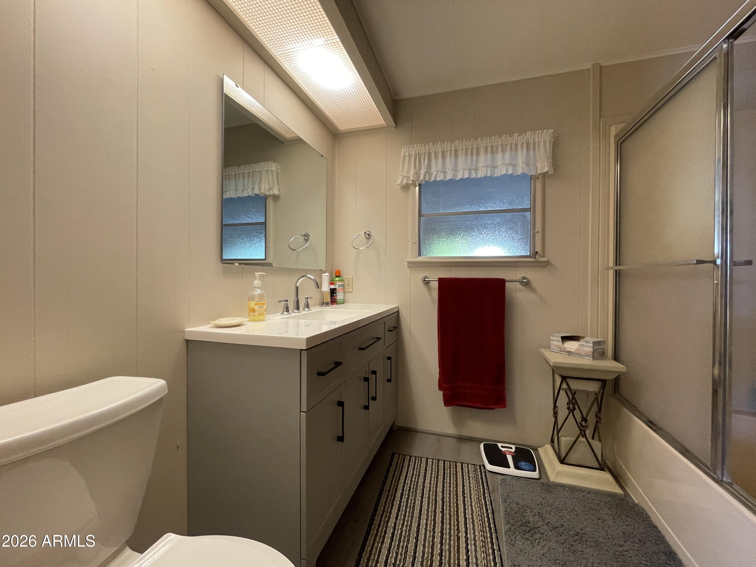 75 East Lynn Way Queen Valley, AZ 85118 - Photo 13 of 24 a bathroom with a sink toilet and shower