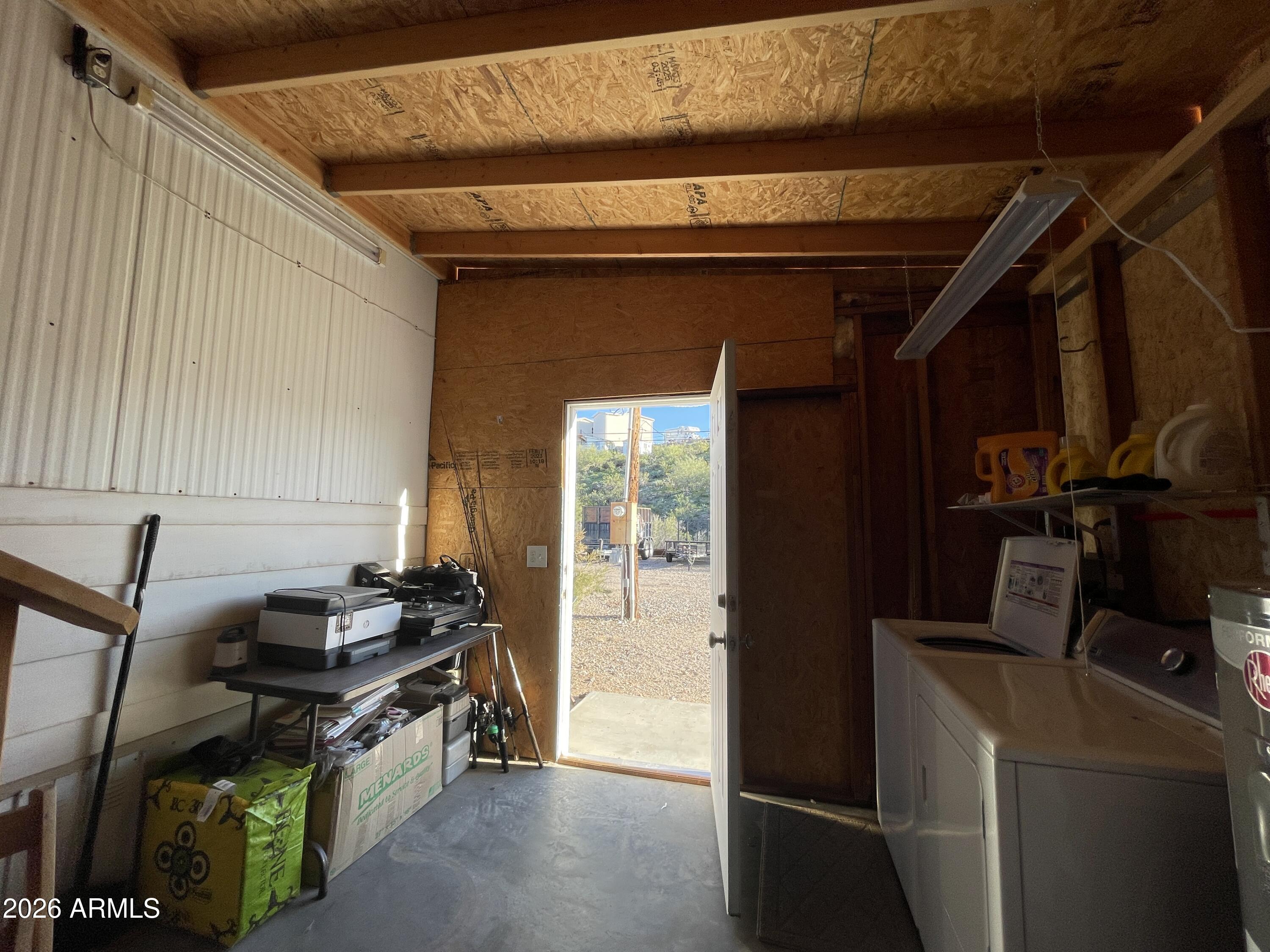75 East Lynn Way Queen Valley, AZ 85118 - Photo 17 of 24 a view of a room with gym equipment