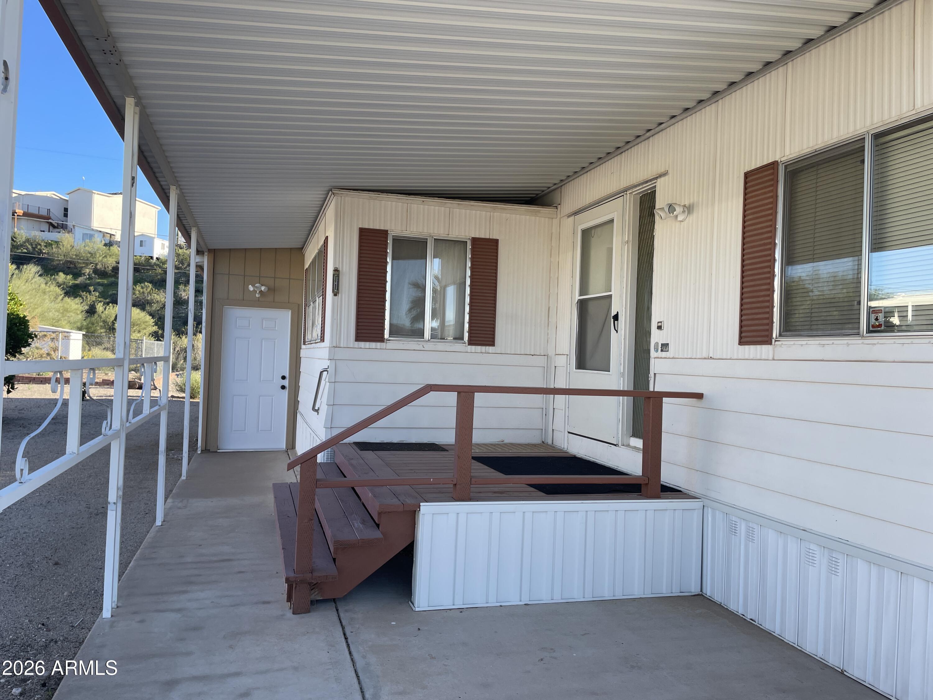 75 East Lynn Way Queen Valley, AZ 85118 - Photo 21 of 24 a view of a porch with furniture