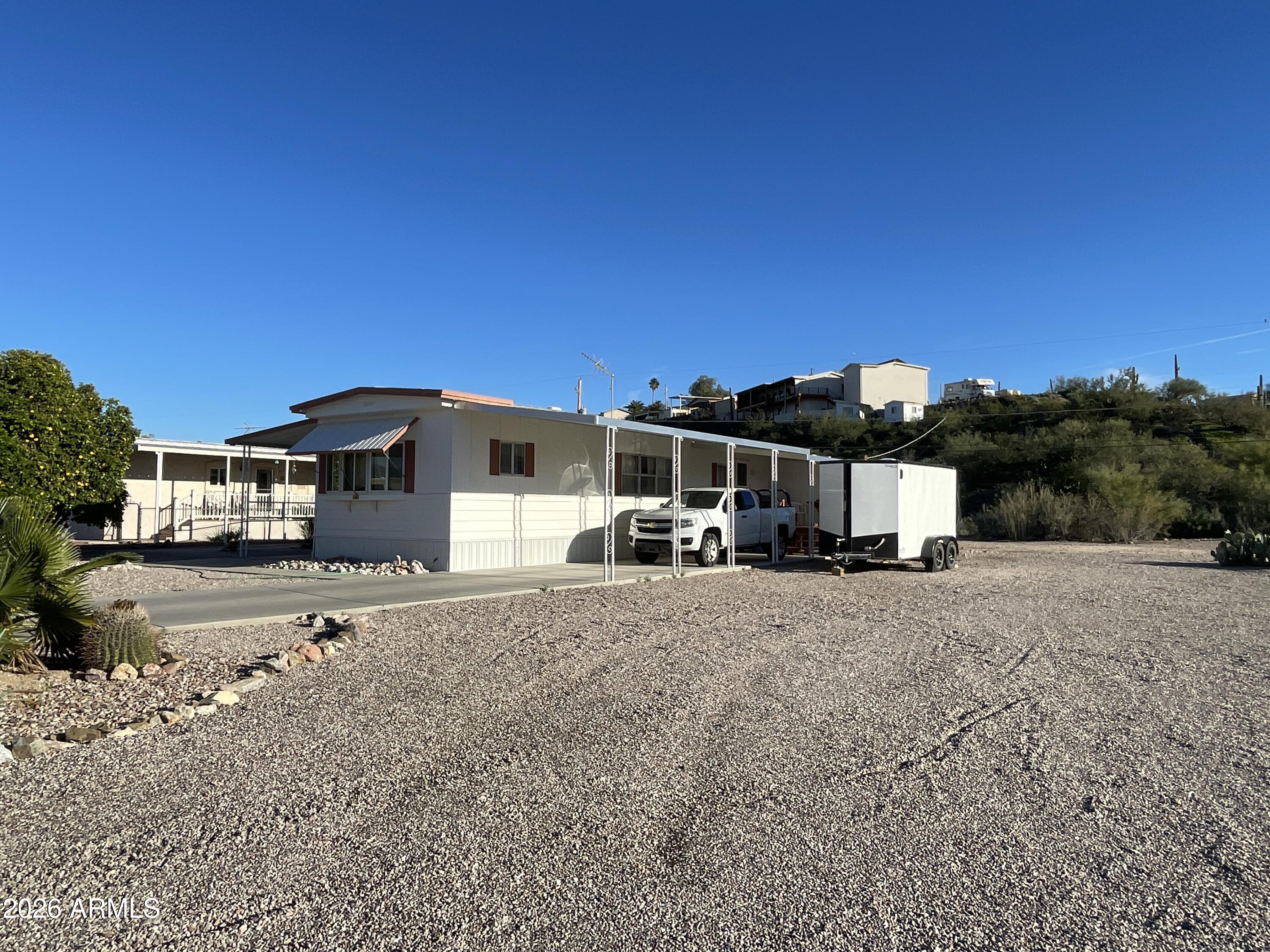 75 East Lynn Way Queen Valley, AZ 85118 - Photo 5 of 24 a view of a house with a yard