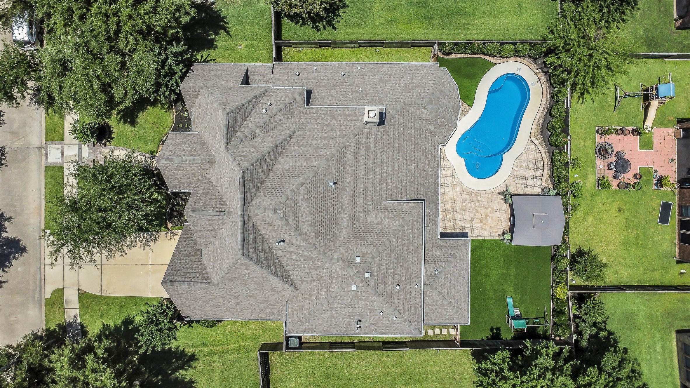 12207 Shorebridge Road Cypress, TX 77433 - Photo 32 of 41 an aerial view of a house with a swimming pool