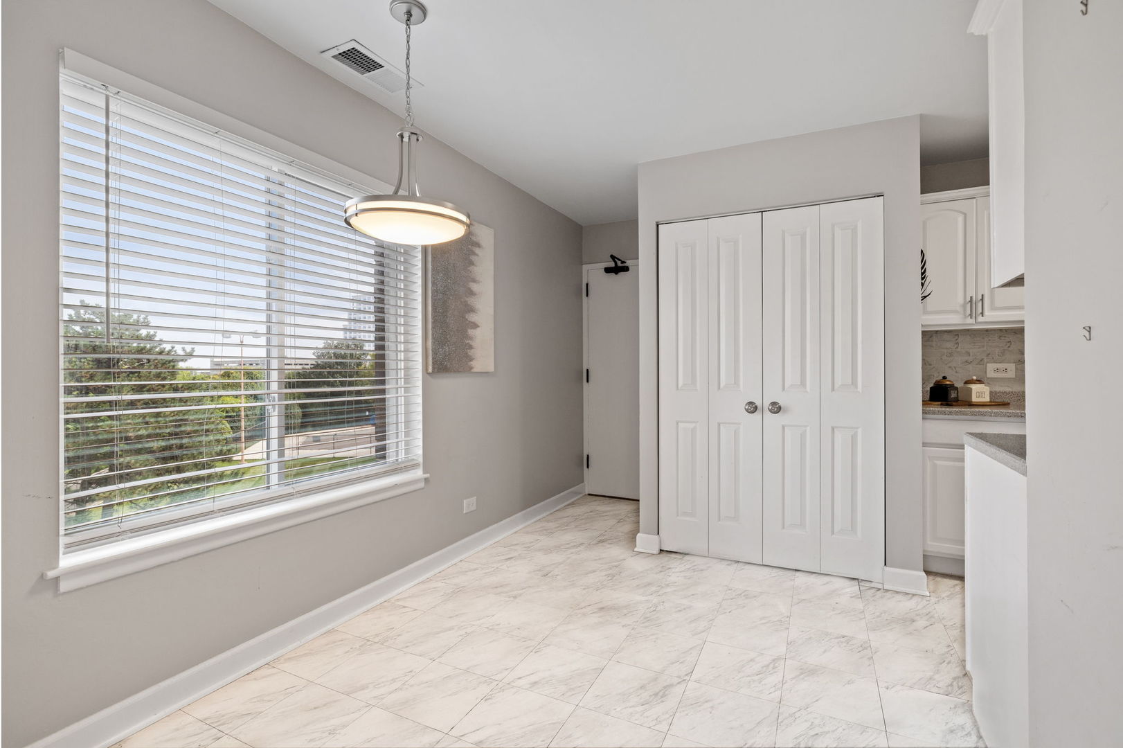 2201 South Grace Street, Unit 305 Lombard, IL 60148 - Photo 13 of 31 a view of an empty room with a window