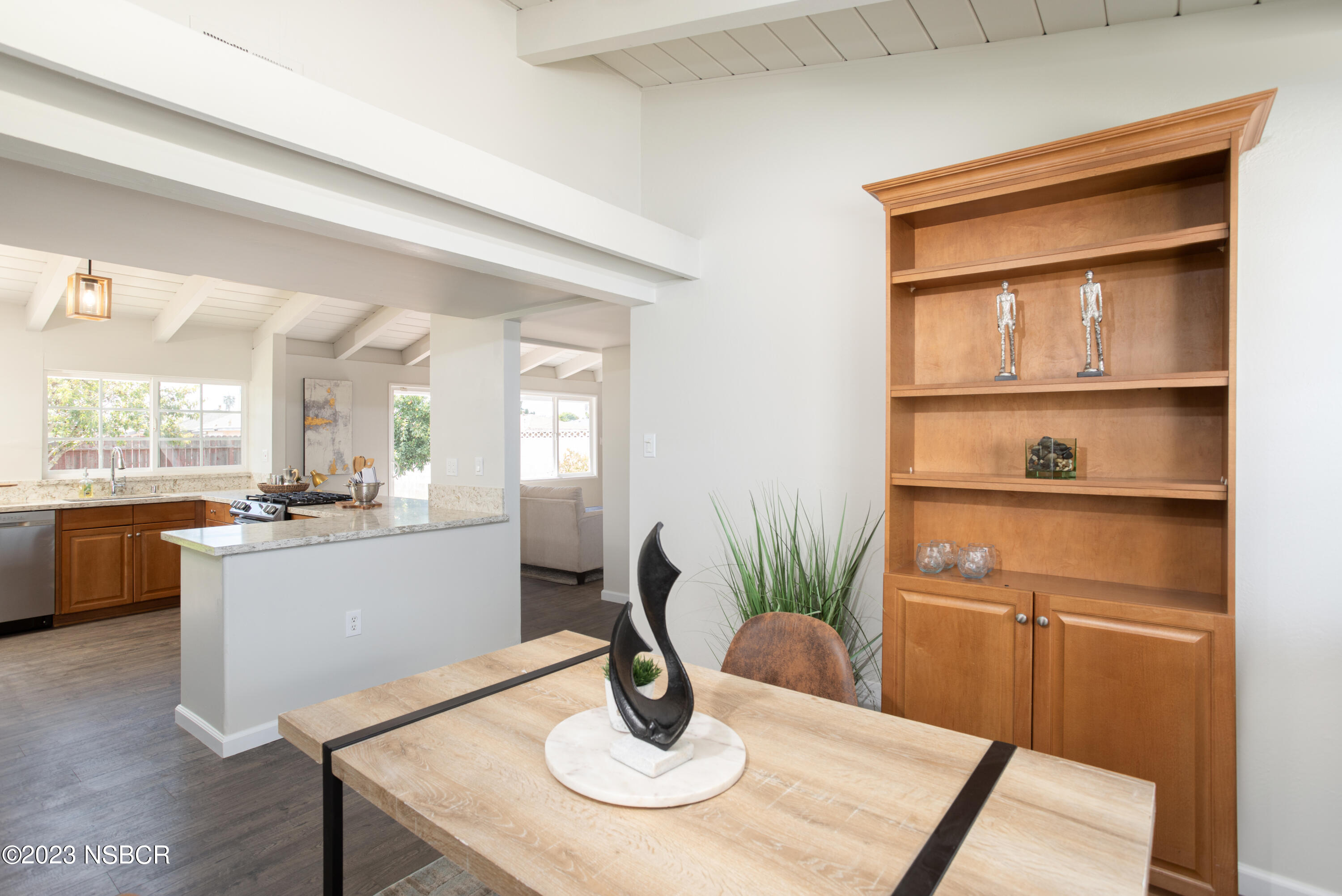 303 North Third Street Lompoc, CA 93436 - Photo 19 of 31 a dining room with a table and chairs