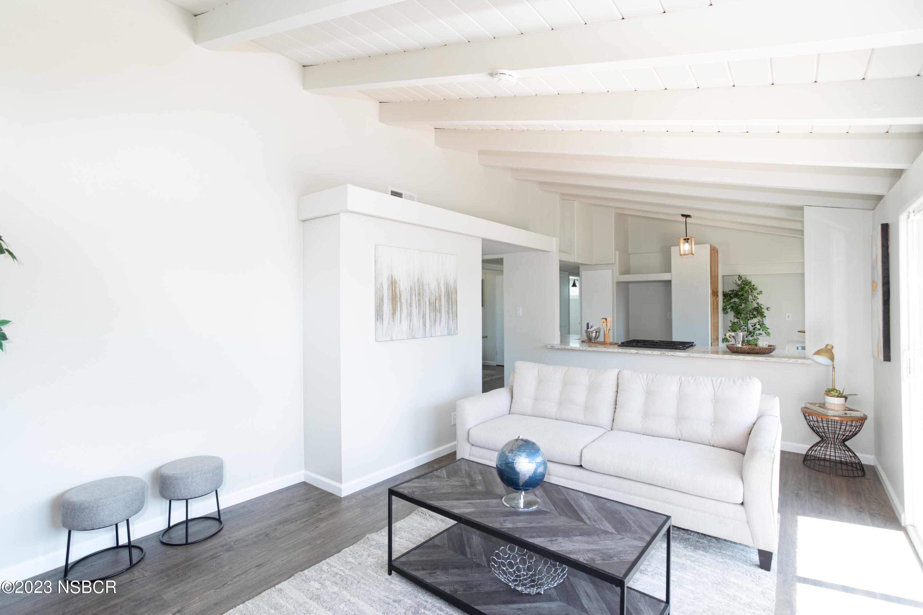 303 North Third Street Lompoc, CA 93436 - Photo 5 of 31 a living room with furniture and wooden floor