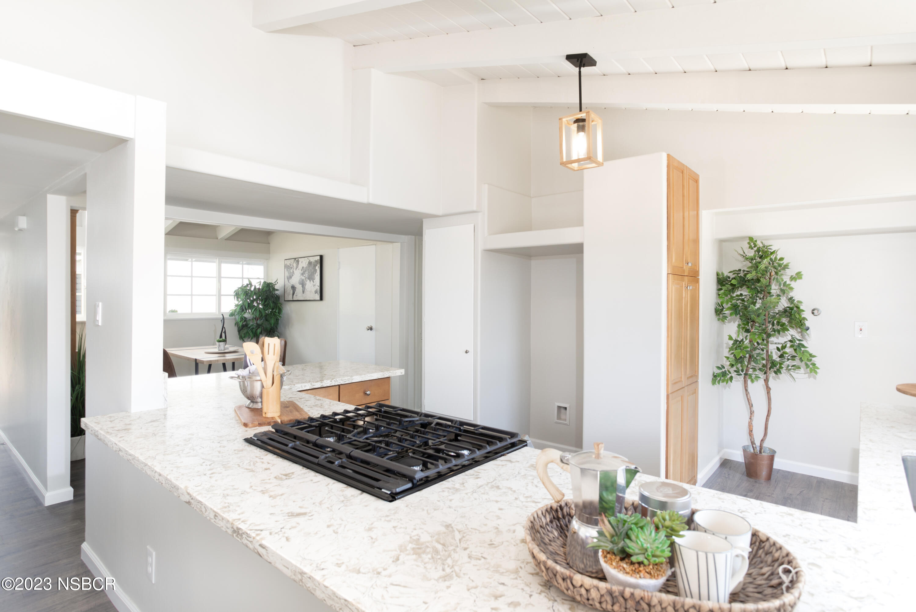 303 North Third Street Lompoc, CA 93436 - Photo 10 of 31 a living room with stainless steel appliances kitchen island granite countertop a sink and a refrigerator