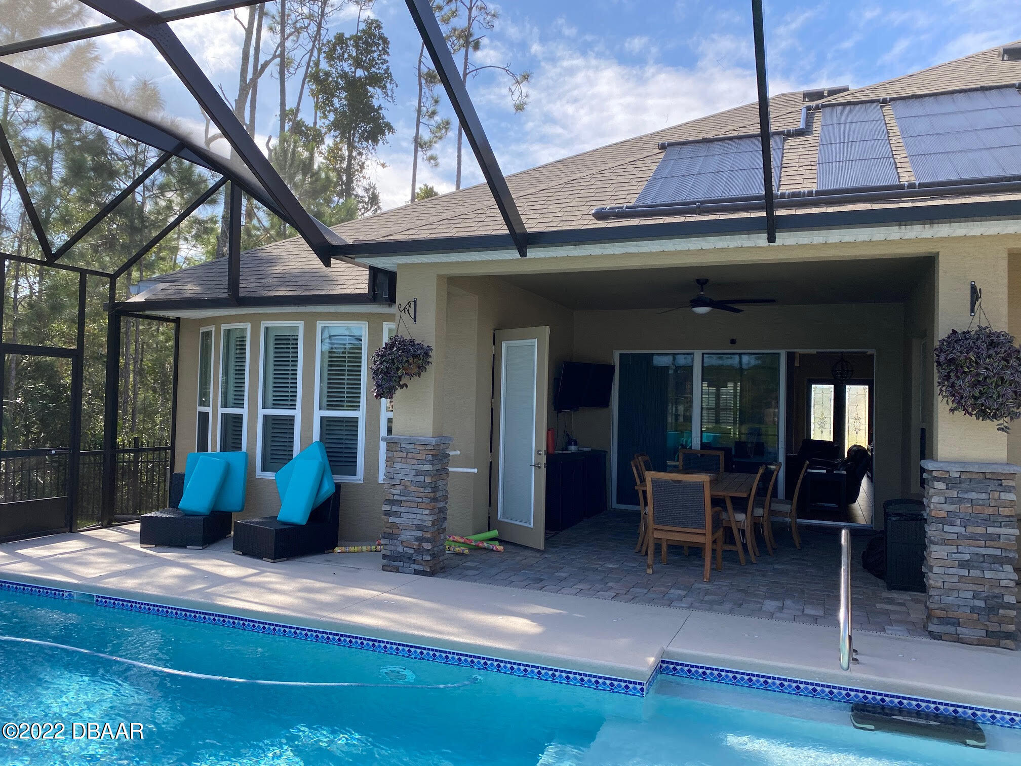 26 Ashford Lakes Drive Ormond Beach, FL 32174 - Photo 24 of 25 a view of a building with sitting area