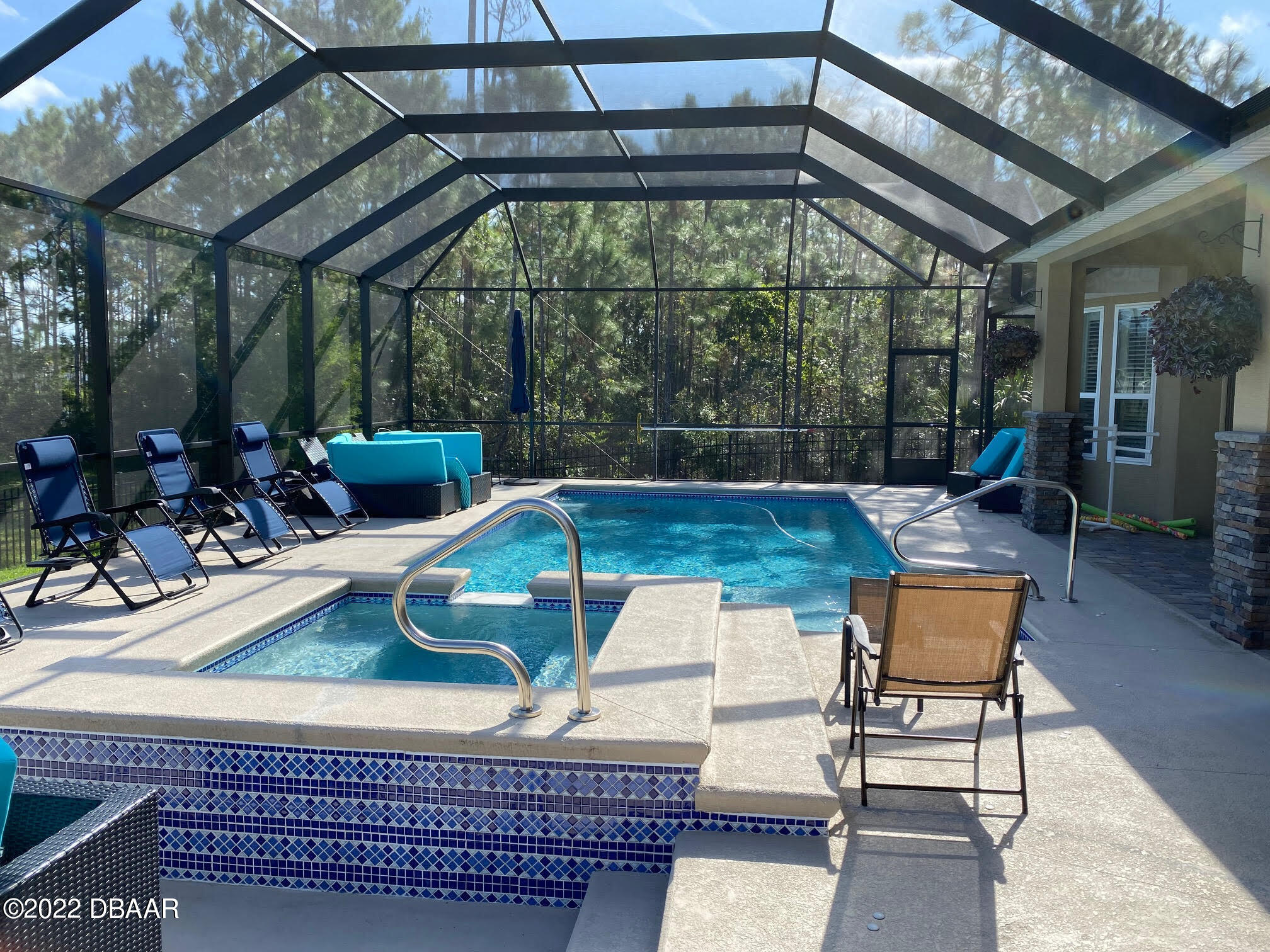 26 Ashford Lakes Drive Ormond Beach, FL 32174 - Photo 25 of 25 a view of a chairs and table in the patio