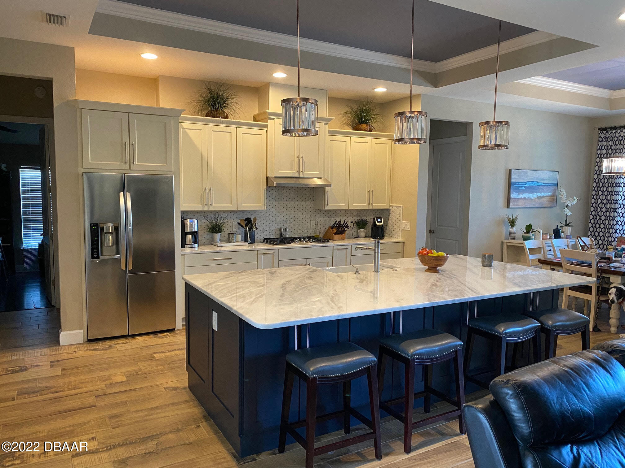 26 Ashford Lakes Drive Ormond Beach, FL 32174 - Photo 3 of 25 a kitchen with stainless steel appliances granite countertop a sink refrigerator and cabinets