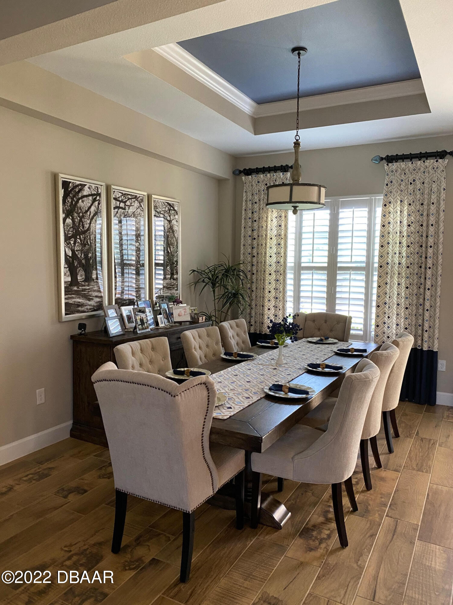 26 Ashford Lakes Drive Ormond Beach, FL 32174 - Photo 9 of 25 a view of a dining room with furniture window and wooden floor