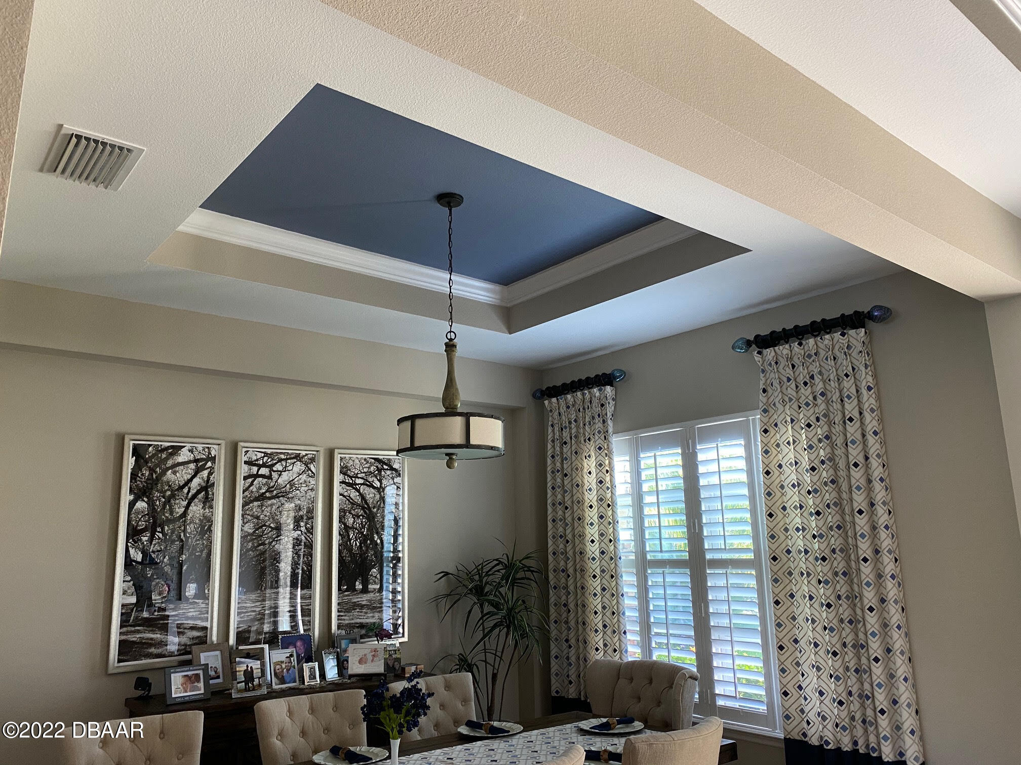 26 Ashford Lakes Drive Ormond Beach, FL 32174 - Photo 10 of 25 a view of a livingroom with furniture and chandelier