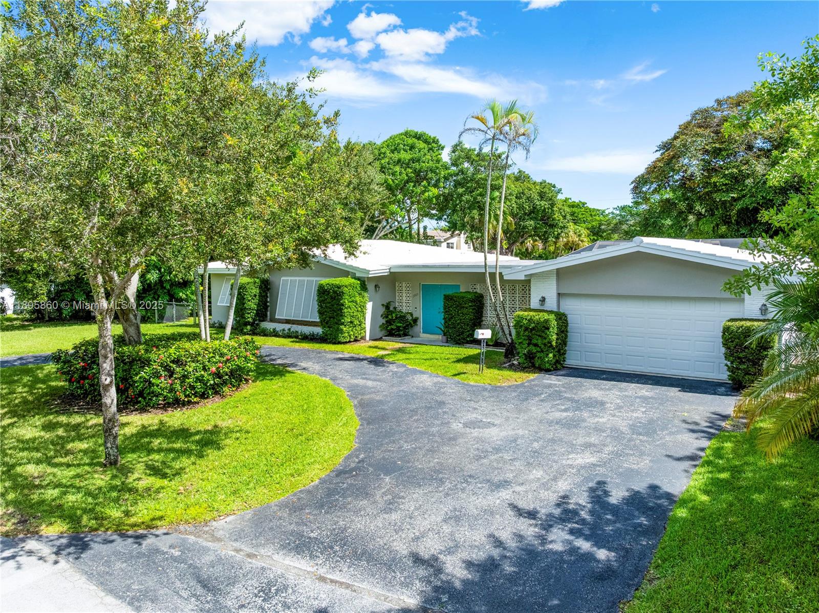 13905 Southwest 78th Court Palmetto Bay, FL 33158 - Photo 2 of 32 a view of a house with backyard and sitting area