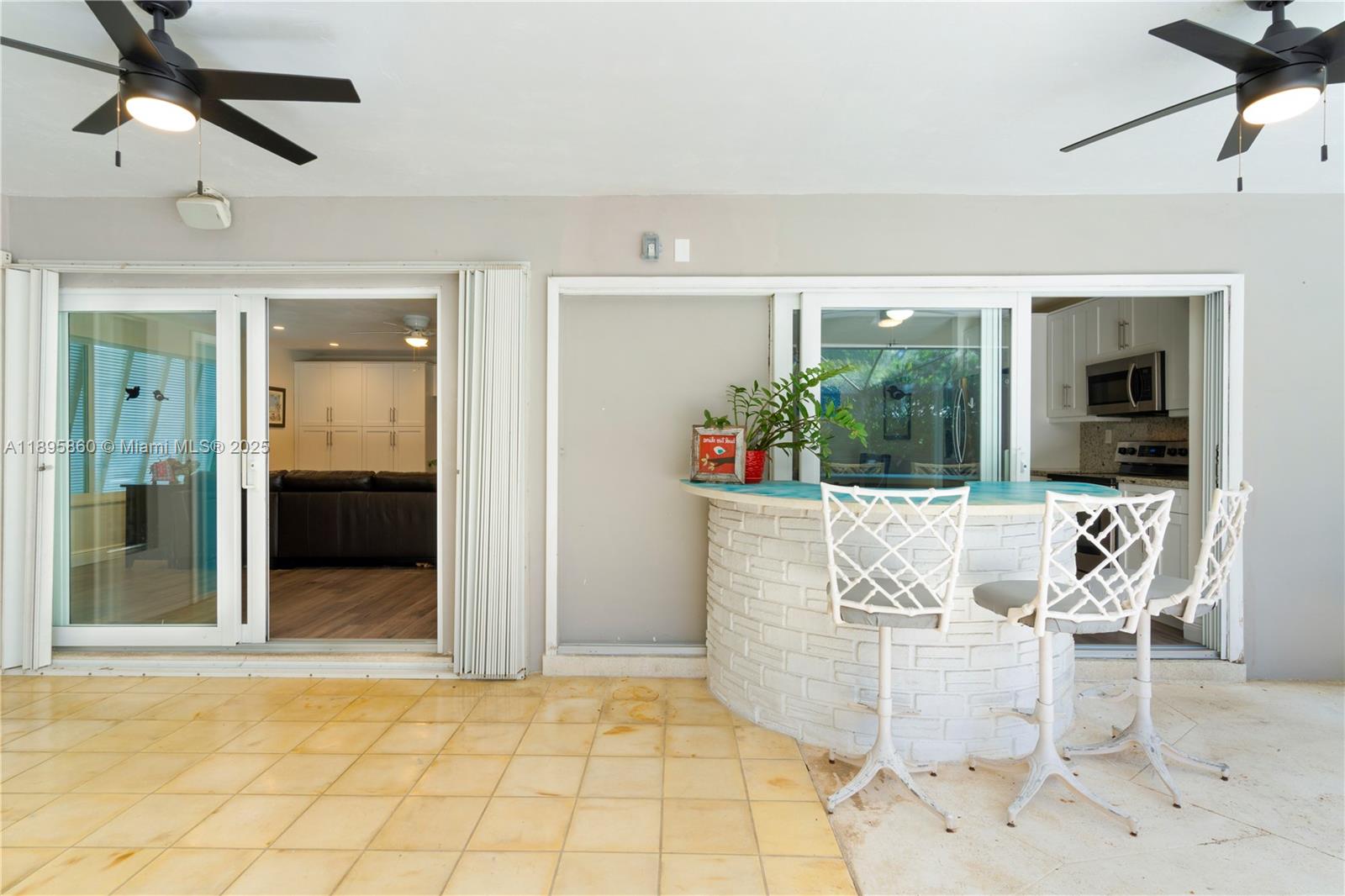 13905 Southwest 78th Court Palmetto Bay, FL 33158 - Photo 21 of 32 a living room with furniture
