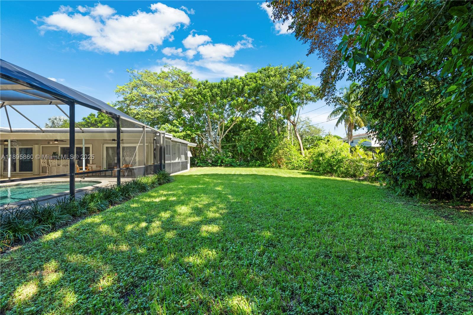 13905 Southwest 78th Court Palmetto Bay, FL 33158 - Photo 28 of 32 a view of a house with backyard and garden