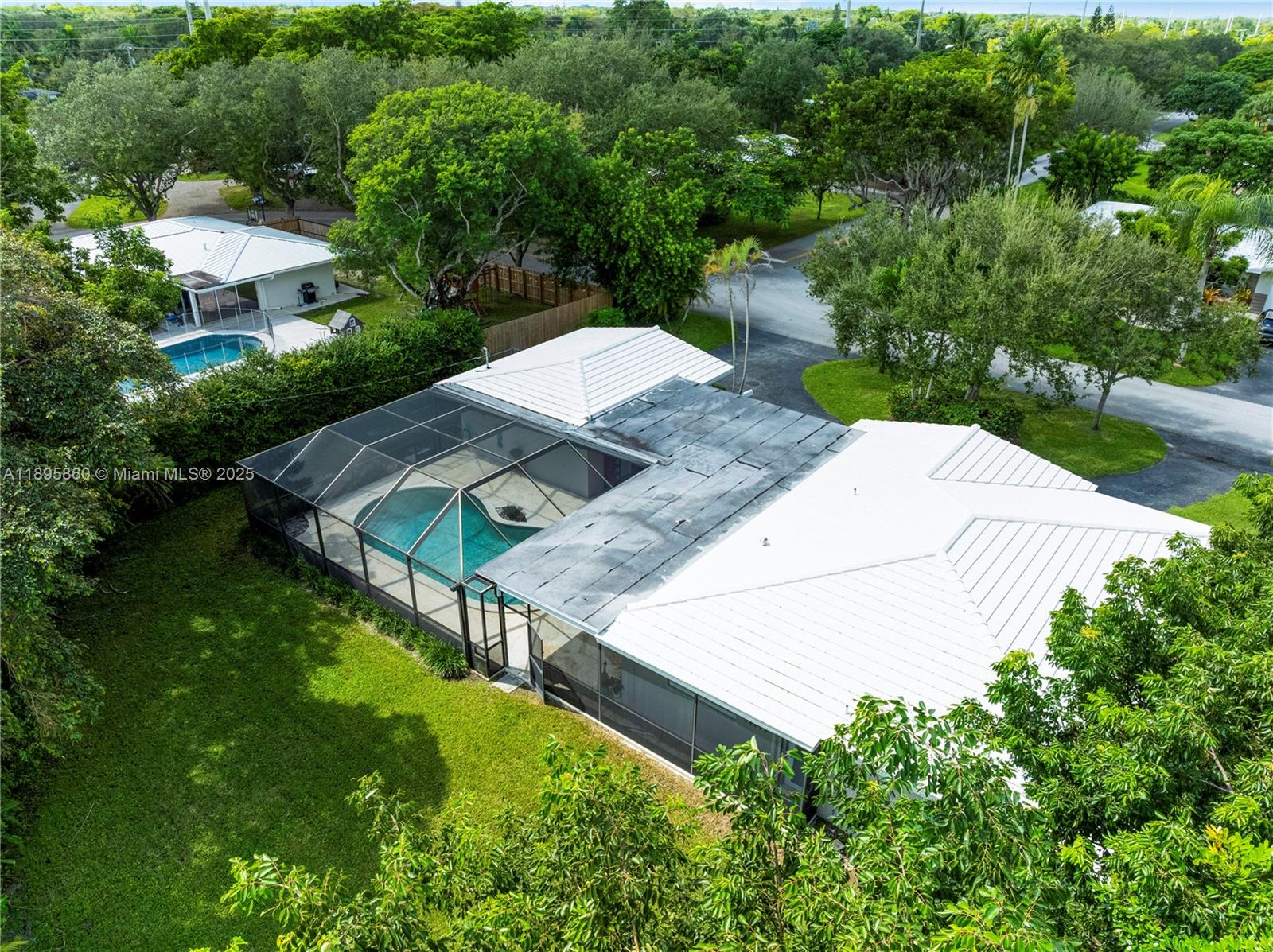 13905 Southwest 78th Court Palmetto Bay, FL 33158 - Photo 31 of 32 an aerial view of a house