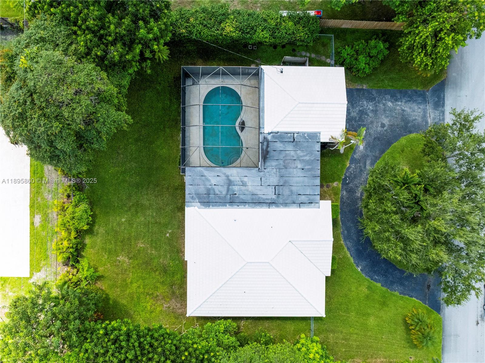 13905 Southwest 78th Court Palmetto Bay, FL 33158 - Photo 32 of 32 an aerial view of a house with garden space sitting space and garden