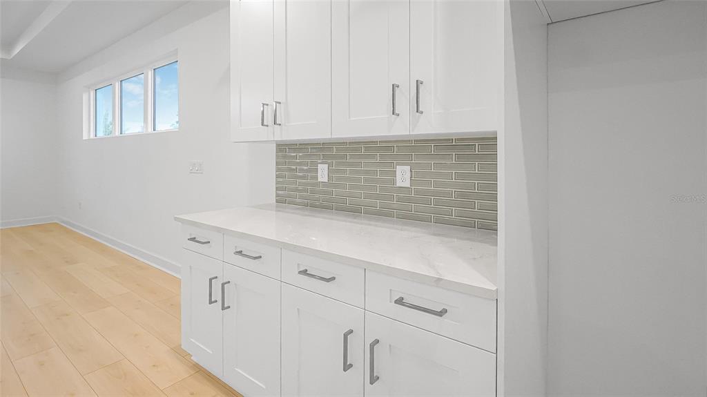 1615 Bellagio Loop Tavares, FL 32778 - Photo 25 of 39 a view of white cabinets and window