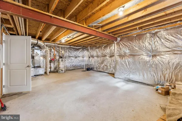 a view of a room with wooden walls